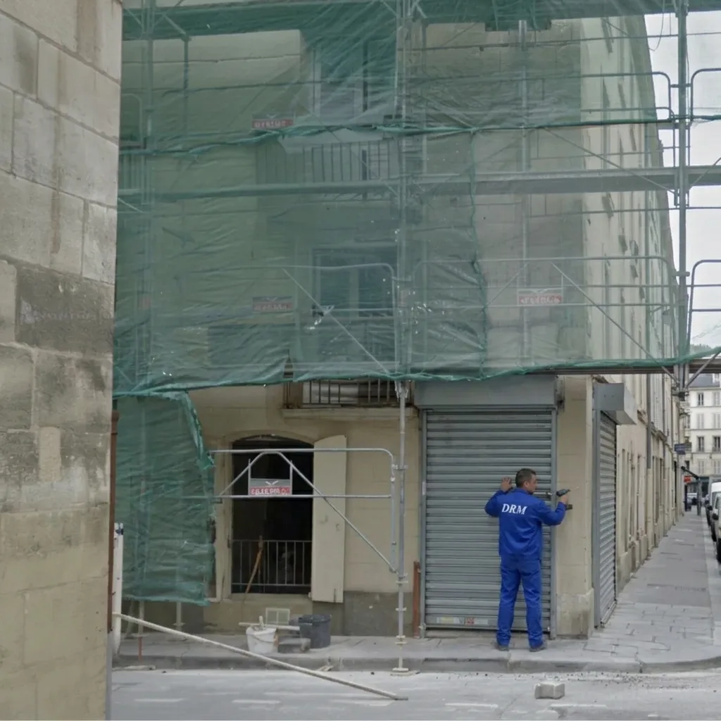 Rideau neuf sur une devanture — Rideau métallique à Rueil-Malmaison Rideau neuf sur une devanture — Rideau métallique à Rueil-Malmaison